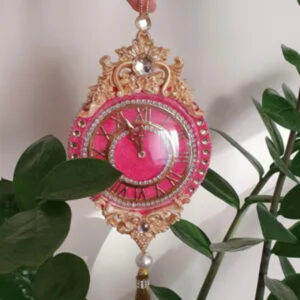 Handmade dark rose velvet Christmas clock ornament with golden dial, rhinestones, and tassel