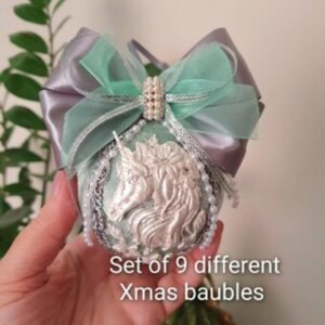 Handmade velvet Christmas ornaments set in beige, silver, and mint. Unique festive designs, lightweight and durable, perfect for holiday decor or gifting.