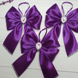 Set of 10 handmade violet silk Christmas bows with elegant shimmer for holiday decorations