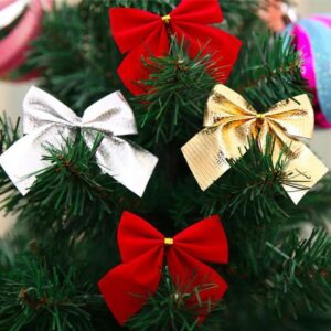 Christmas tree decorated with elegant silk Christmas bows