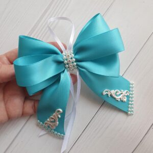 Handmade silk Christmas bows with decorative embellishments
