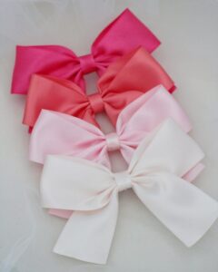 Handmade Christmas tree bows with elegant fabric details