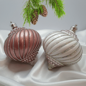 Set of 2 handmade acrylic spinning top Christmas ornaments with rhinestones in dark pink and white colors for festive tree decor
