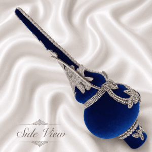 Elegant blue velvet Christmas tree topper with ornate silver embellishments