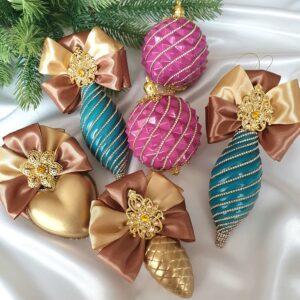 Turquoise, pink, and gold Christmas ornament set with rhinestones and decorative bows