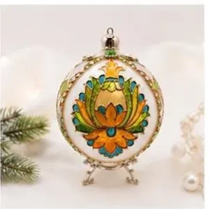 Hand-painted stained glass Christmas ornament with turquoise, green, blue and golden botanical design