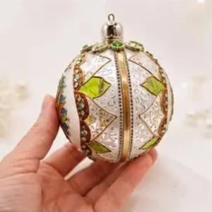Reverse side of a colourful botanical Christmas ornament